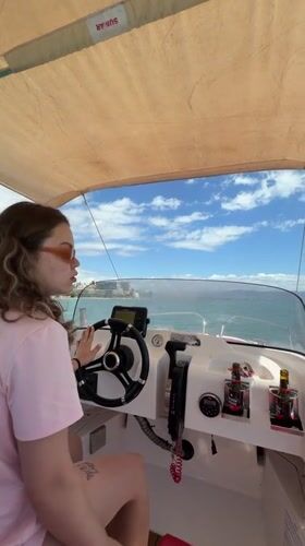 Couple enjoys sunny morning boat ride off Torremolinos coast