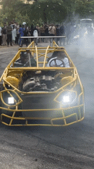 Custom drift car performs for crowd in Abuja parking lot