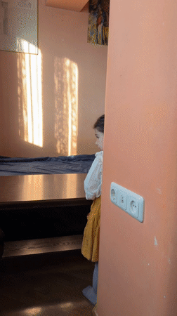 Quiet afternoon moments captured in Yerevan home with young girl