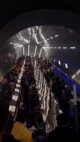 Crowds gather at Jerusalem train station, use escalators