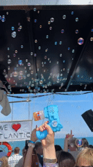 Person creates bubble display in Turkish town square