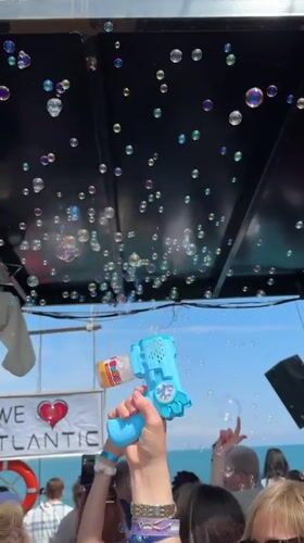 Person creates bubble display in Turkish town square