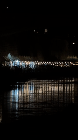 Rome's Tiber riverbank alive with evening dining and markets