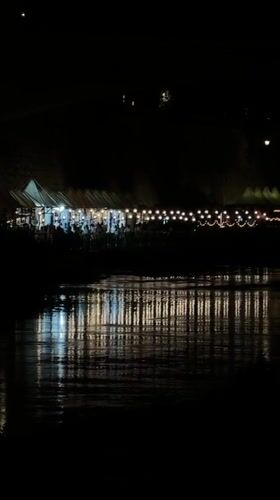 Rome's Tiber riverbank alive with evening dining and markets