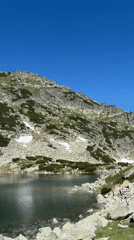 Alpine lake and snowy slopes near Samokov, Bulgaria