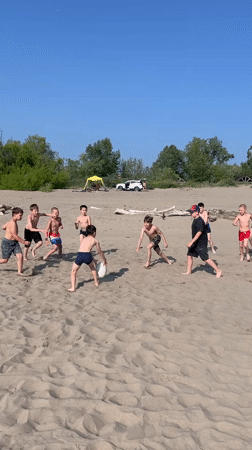 Busy summer beach day in Krasnoturansk, Russia