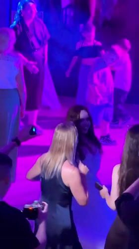 Indoor party with colored lights and dancing in Galevo