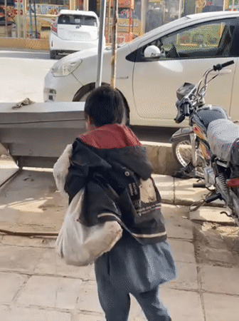 Children seen on Kandahar streets during sunny April day