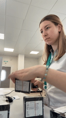 Woman in lab coat scans boxes in Moscow