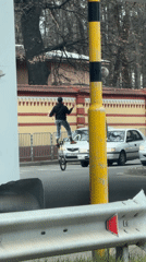 Street performer unicycles and juggles in Sofia
