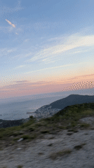 Driver captures sunset coastal view in Stanišići, Montenegro