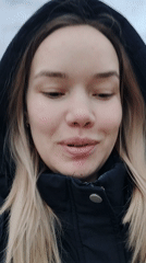 Woman takes selfies in Markovskii residential area