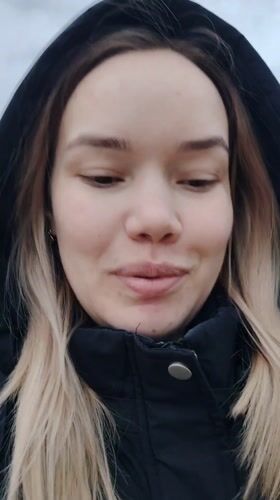 Woman takes selfies in Markovskii residential area