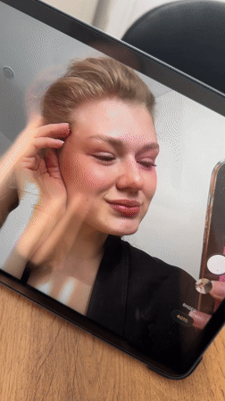 Woman documents morning beauty routine in Kazan apartment