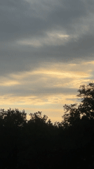 Dawn sky observed over Nizhny Novgorod with sleeping child