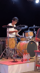 Musicians perform live set at Indonesian outdoor venue