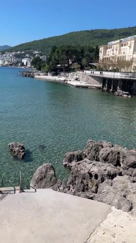 Sunny morning brings visitors to Opatija's scenic Croatian coastline