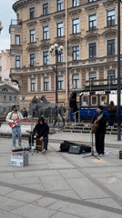Street musicians perform outdoor concert in Saint Petersburg square