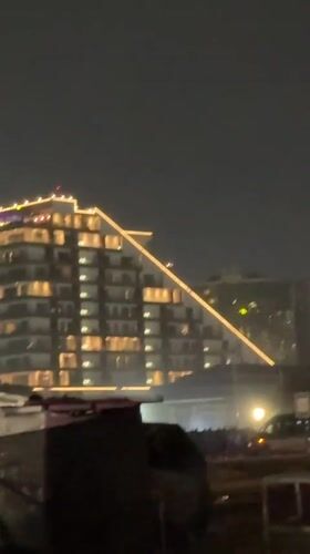 Nighttime commercial district activity documented in Accra