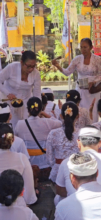 Traditional Balinese Hindu ceremony held in Denpasar temple compound
