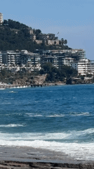 Beach day memories captured at unknown coastal town
