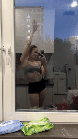 Woman Takes Mirror Selfie in Kitchen, Khimki Russia