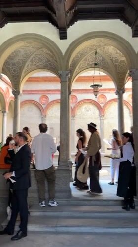 Inside a frescoed courtyard in Milan