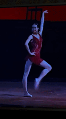 Ballet performance in red sequined dress on Ufa stage