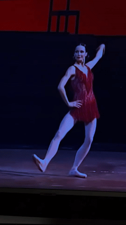 Ballet performance in red sequined dress on Ufa stage