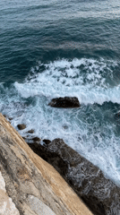 Tourists document scenic Budva coastline and architecture views