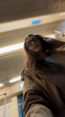 Woman films herself exiting Moscow subway train