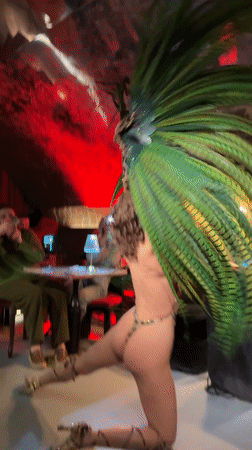 Feathered performer entertains at Moscow nightclub venue