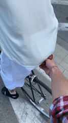 Cyclist and skateboarder share Tel Aviv bike lanes Monday morning