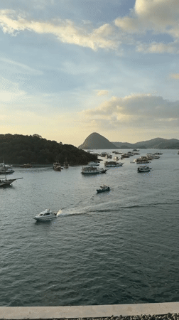 Harbor activity documented in Labuan Bajo, Indonesia morning scene