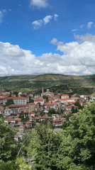 Valley town with red roofs filmed near Veliko Tarnovo