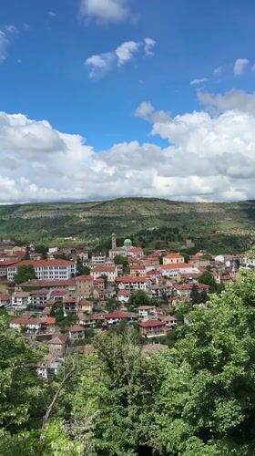Valley town with red roofs filmed near Veliko Tarnovo