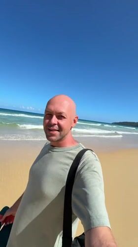 Barefoot on Karon Beach, Andaman Sea calm and clear