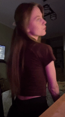 Woman in purplish-lit room captured on video in Ufa