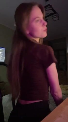Woman in purplish-lit room captured on video in Ufa