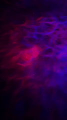 Animated nebula clip with deep purples and cosmic color.