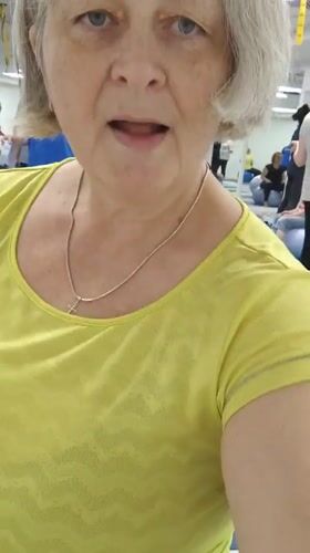 Woman leads exercise class with blue balls in Krasnodar gym