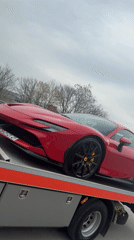 Red Ferrari towed through Plovdiv, Bulgaria