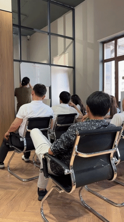 Morning business training session held in modern Astana office