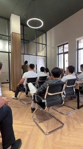 Morning business training session held in modern Astana office