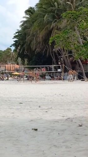Morning beach recreation captured at Ban Tai Subdistrict, Thailand