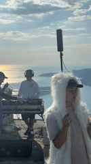 DJ setup at Montenegro scenic overlook with mountain ocean views