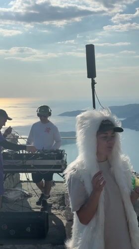 DJ setup at Montenegro scenic overlook with mountain ocean views