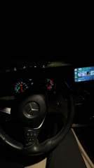 Cars parked with hazard lights flashing in Blagoevgrad at night