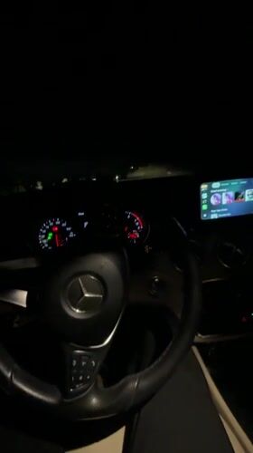 Cars parked with hazard lights flashing in Blagoevgrad at night