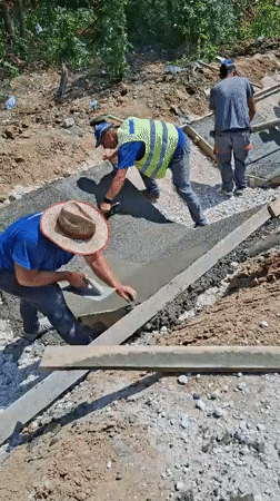 Concrete drainage channel going in at a Hîncești construction site